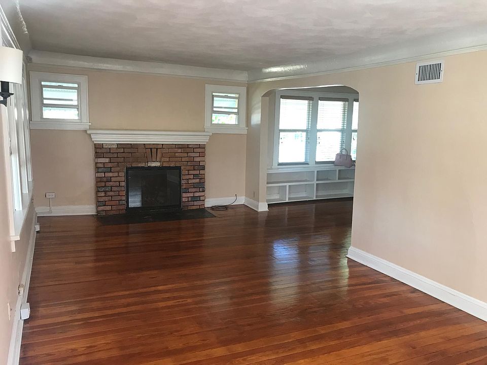 Spacious living area with lots of windows