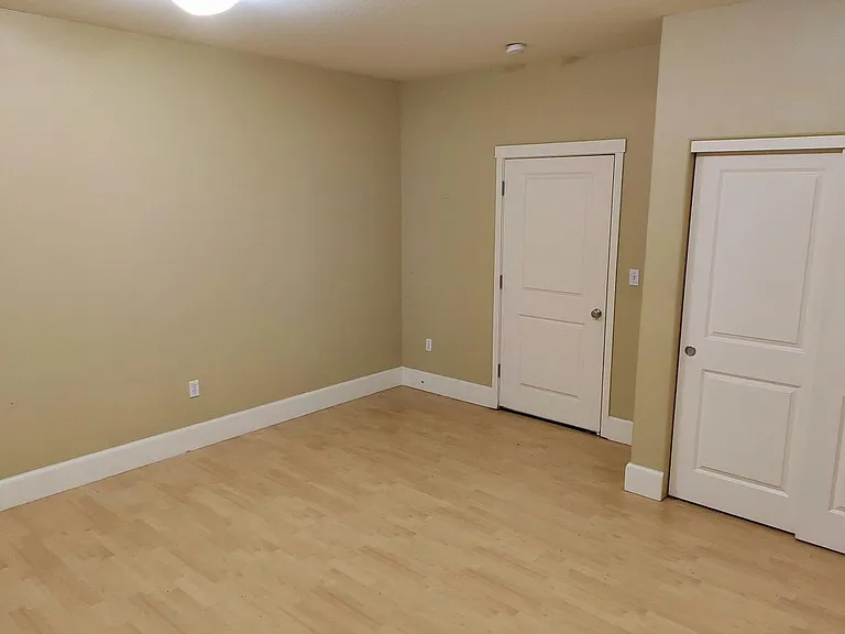 Bonus room on the first floor by the garage, has a closet too.