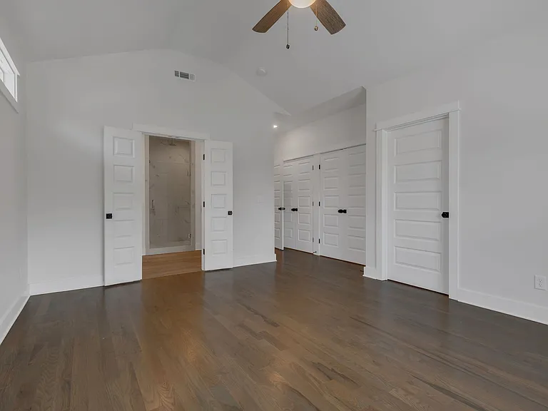 Primary Suite #2 (upstairs) - overlooking driveway.