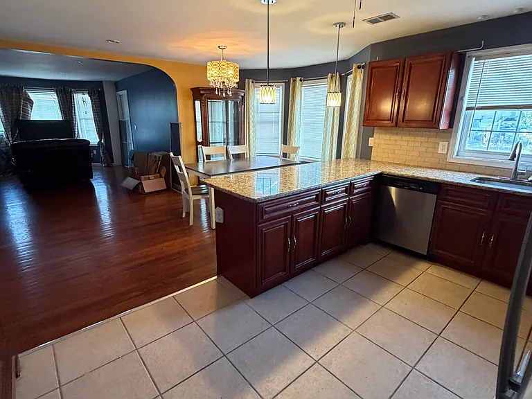 Huge Open-Concept Shared Kitchen, Dining and Living Room Spaces.