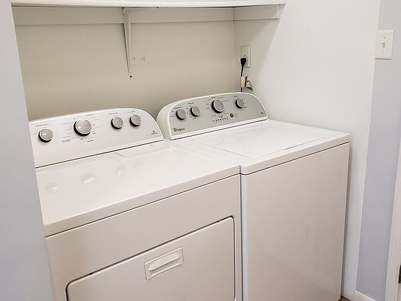 Main floor laundry room in bathroom
