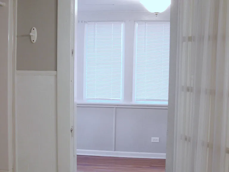 bathroom-door leads to sunroom
