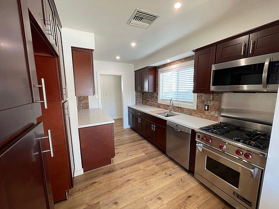 Custom chefs kitchen featuring Wolf stove