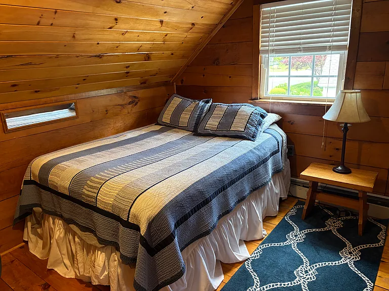 Upstairs bedroom with queen bed
