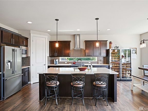 Open kitchen with dining room