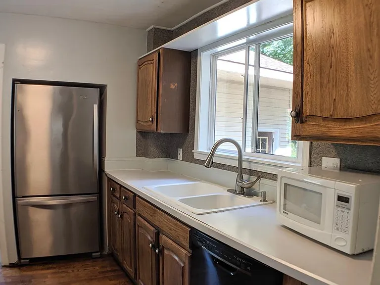 Kitchen, with view to back yard