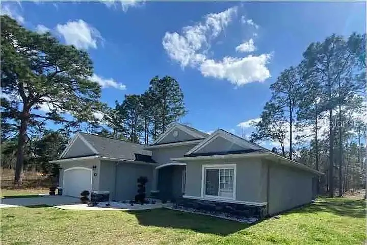 696 Marion Oaks Trl — Photo 30