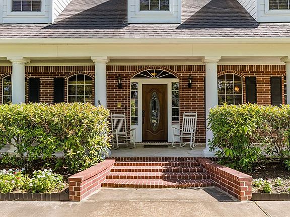Sit and relax on the inviting front porch.