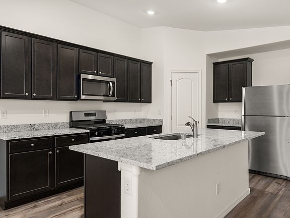 This kitchen has granite countertops