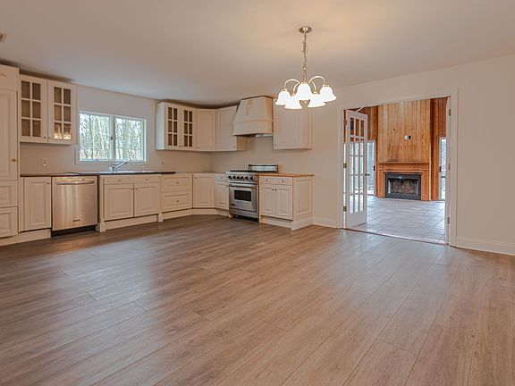 Beautiful spacious kitchen opening to a Great Room. Stainless appliances and Sub-zero refrigerator.	