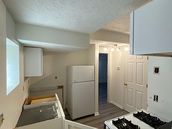 Looking through living room to kitchen.