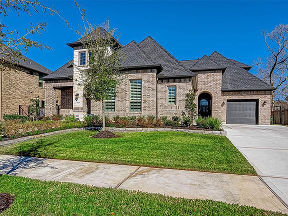 Exquisite exterior and handpicked landscaping will leave you speechless!