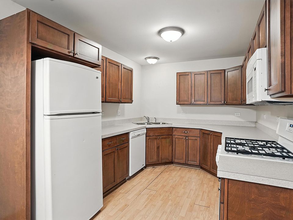 Deluxe eat in kitchen with dishwasher, microwave, and self cleaning range.