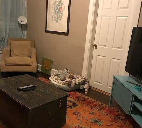 Living room and door to bedroom