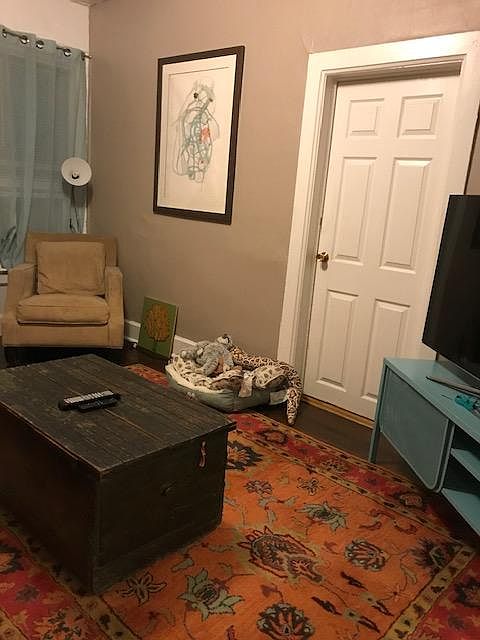 Living room and door to bedroom