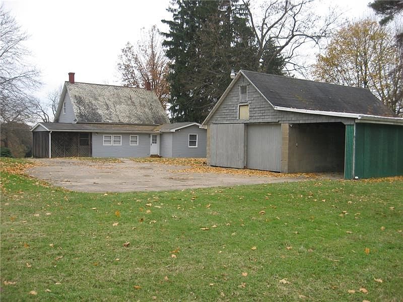 Welcome to 135 Freeport Rd.  This home sits on almost 1 acre lot that backs up to wooded area.
