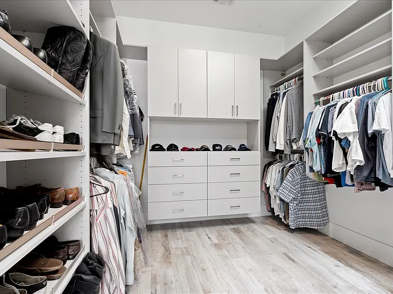 HIS CLOSET VERY LARGE WITH BUILT INS