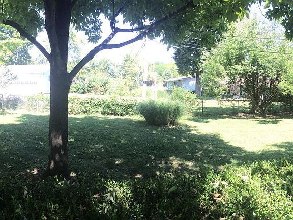 patio and fenced in back yard