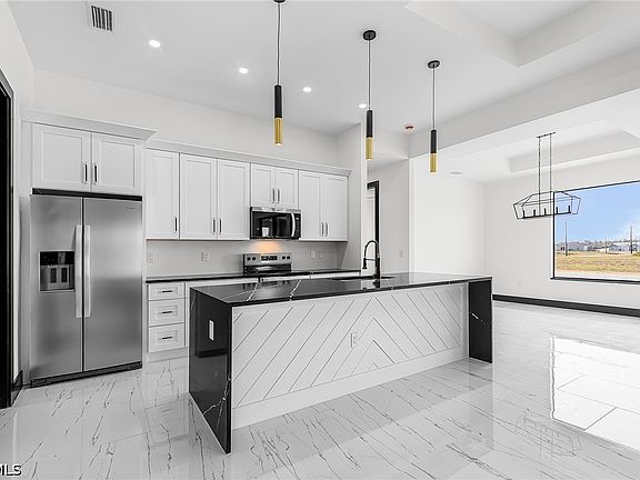 5th image of 9045 W Broad Cir