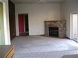 family room with gas fireplace