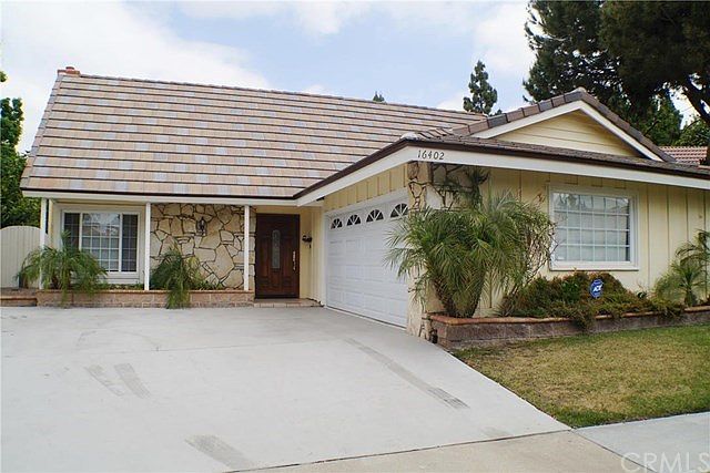 Quiet cul-de-sac location with great curb appeals- Concrete tiled roof, inviting front door.