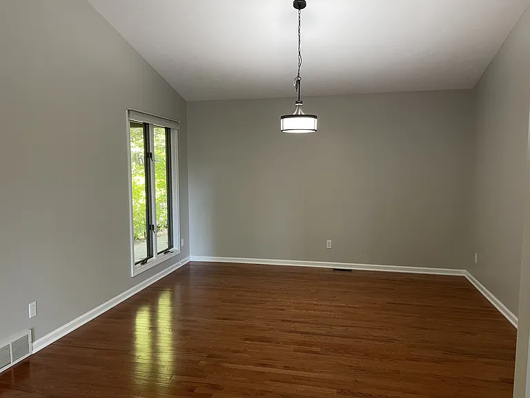 Dining room with vaulted ceiling