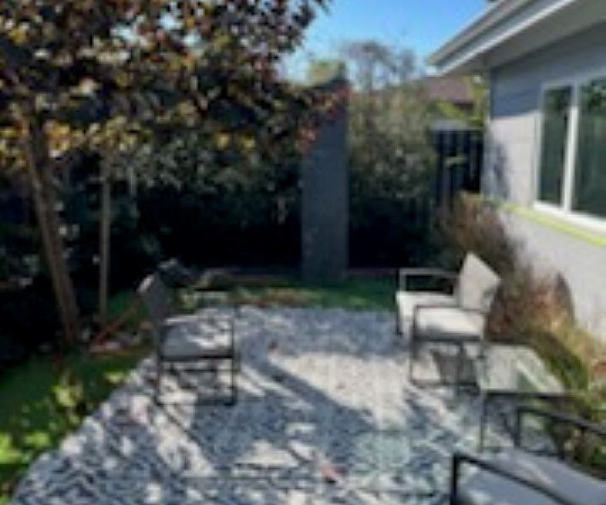 Private fenced courtyard with granite sculpture - patio furniture included