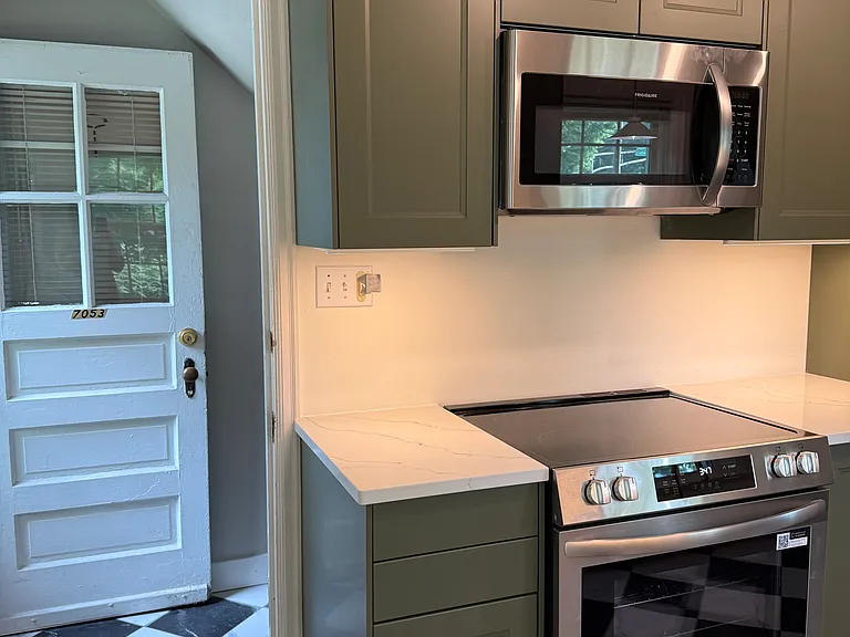 kitchen upon entering the back of the apartment home