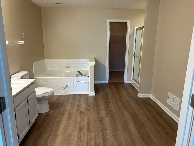 Master bath with separate tub and shower