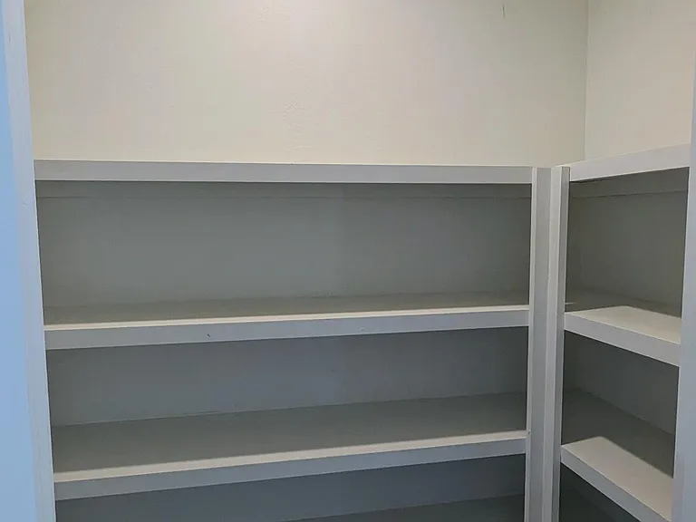 Studio closet with ample shelving