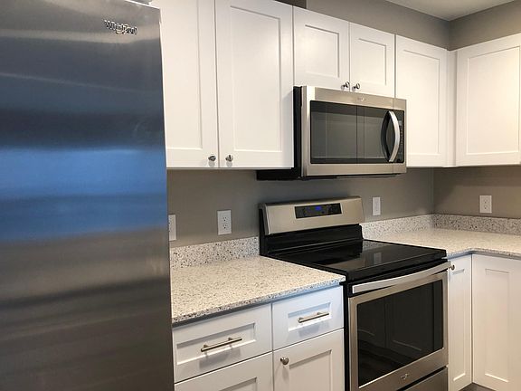 Kitchens with stainless steel appliances (cabinet color will vary)