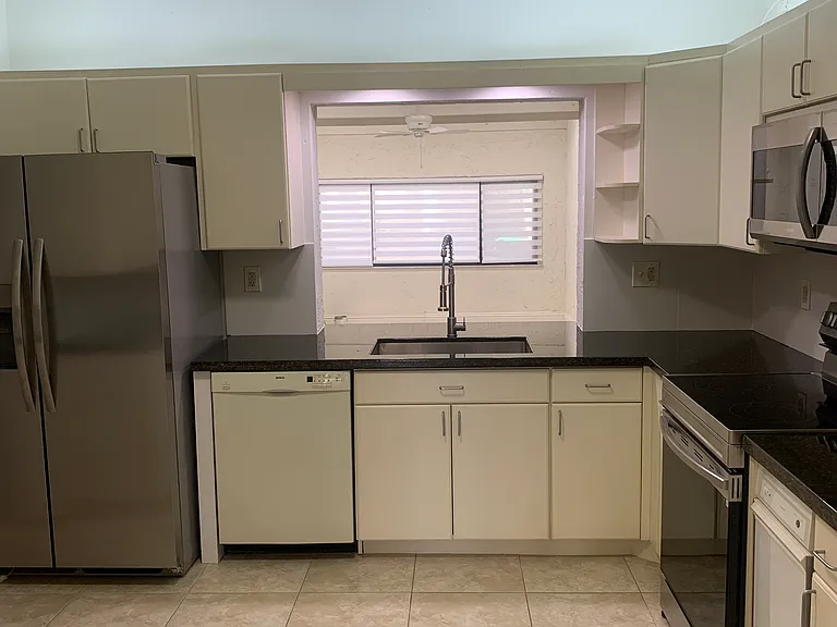 Full kitchen with updated stainless steel appliances