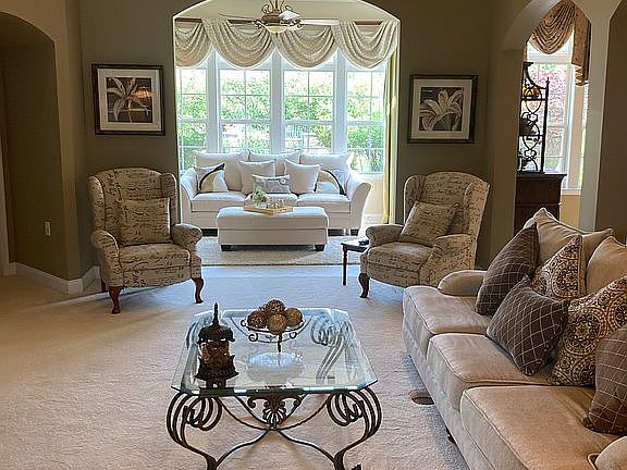 Great room view into Sunroom