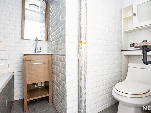 5th image of 142 Scholes St APT 2