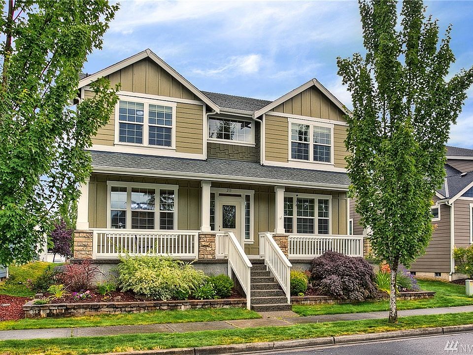 Perfectly positioned overlooking the large community park and lake, sits this wonderful Hidden Lakes residence on a charming tree lined street.