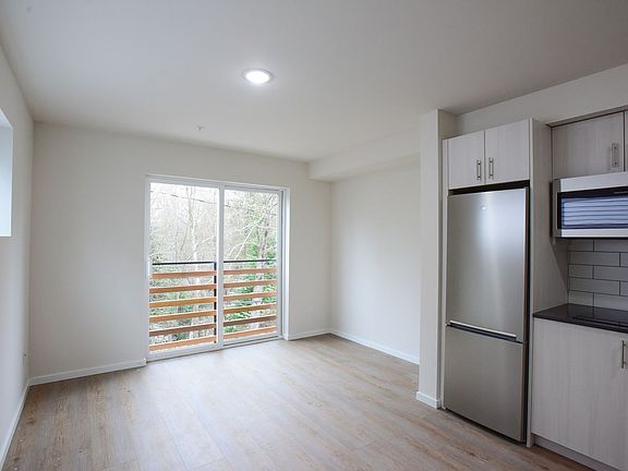 4th image of 9545 Ashworth Ave N #302