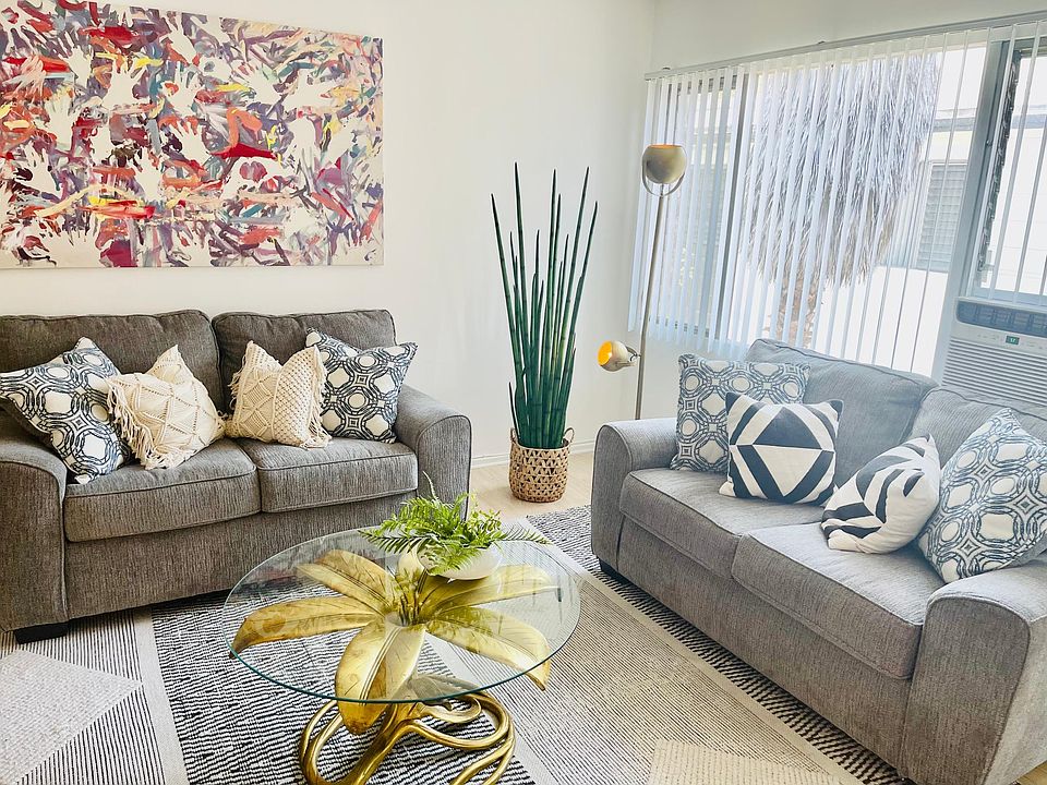 Actual Living Room and actual photos and set up of furniture and fixture. With 2 quality love seat sofa.