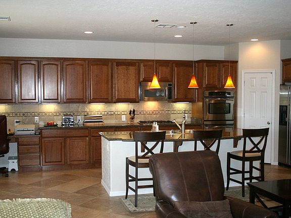 Upgraded Kitchen w/ Granite Slab, Cherry Cabinets 