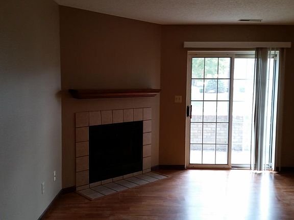 Living room with wbfp and private patio