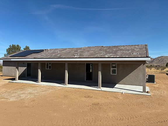 rear of house. Full length patio