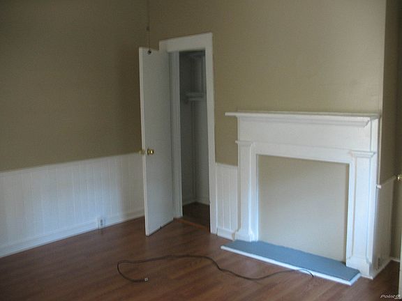Bedroom w/ Hardwood Floors, Ample Closet Space & Faux Firepl