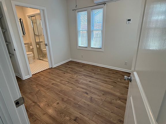 Entry to bedroom with A/C-heater split unit.