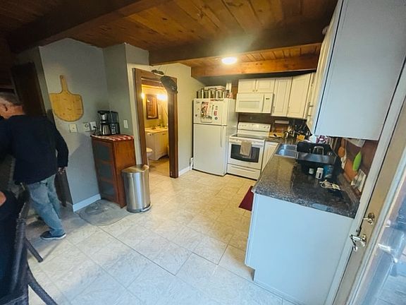 kitchen facing toward half bath for downstairs.
