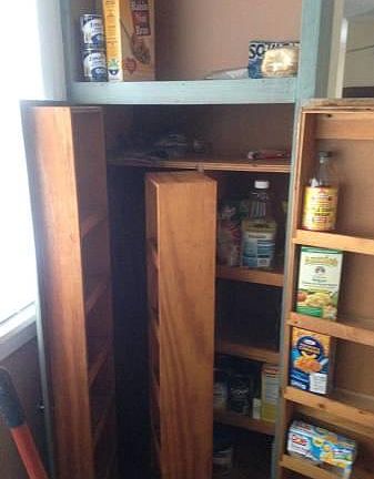 Pantry with hidden storage.