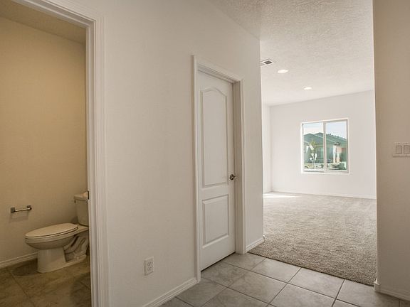 You ll see a powder bath and a closet, perfect for storage.