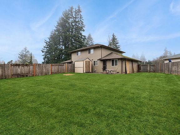 View from back of yard w/ storage