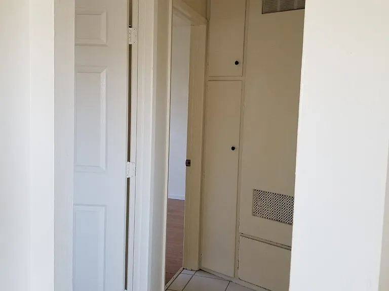 Walkway from the kitchen to the two bedrooms