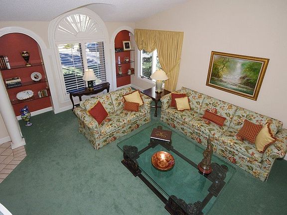 Arched windows, bookcases & door ways.  Plantation shutters & custom drapery.