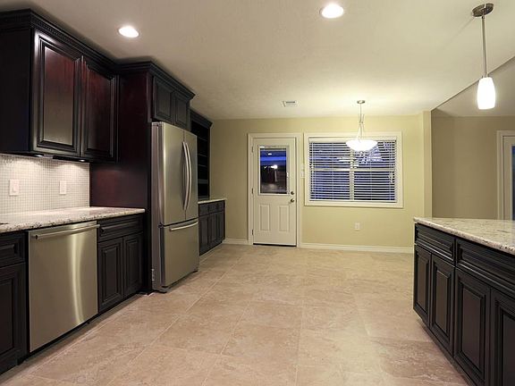 Kitchen also features stainless steel appliances, handmade stainless steel undermount sink, pot filler and moreâ?¦