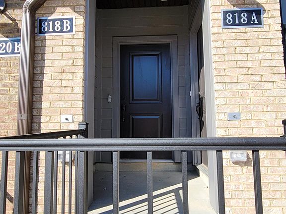 Front entrance (with neighbor unit entrance on the right)